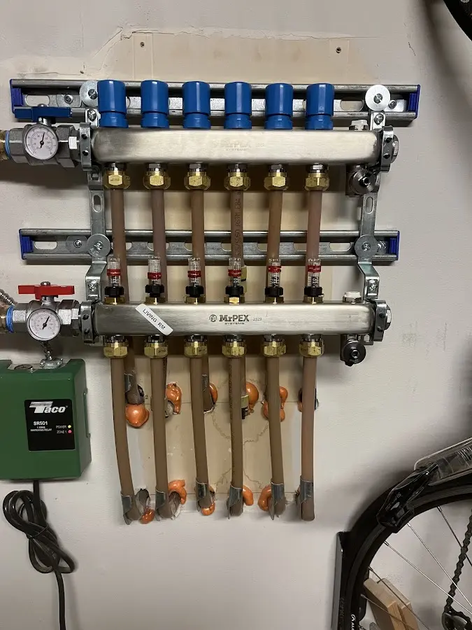 Plumber performing Water Heater Repair at a residential property in Boonville